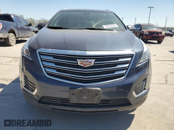 2019 Cadillac XT5 Luxury FWD with VIN 1GYKNCRS1KZ131818, listed as a Copart auction lot 49354595 with 131,995 mi miles and Salvage Title. Bid and sale history available at DreamBid. Image 5.