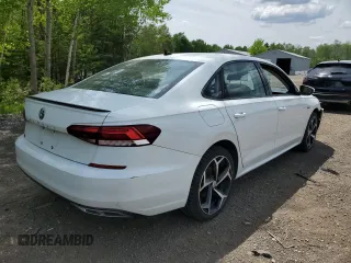 2020 Volkswagen Passat with VIN 1VWEA7A32LC004720, listed as a Copart auction lot 57310295 with 125,589 mi miles and Salvage title. Bid and sale history available at DreamBid. Image 3.