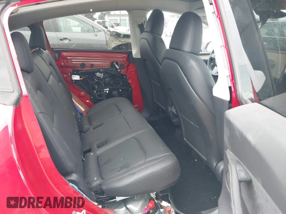 2023 Tesla Model Y Long Range with VIN 7SAYGDEE9PA145947, listed as a IAAI auction lot 42131783 with 4,956 mi miles and . Bid and sale history available at DreamBid. Image 8.