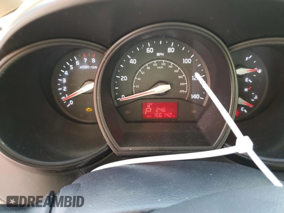 2014 Kia Rio LX with VIN KNADM4A37E6356601, listed as a Copart auction lot 71753504 with 166,142 mi miles and Salvage Title. Bid and sale history available at DreamBid. Image 9.