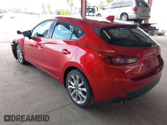 2014 Mazda 3 S Grand Touring with VIN JM1BM1M38E1200696, listed as a IAAI auction lot 41906426 with 50,048 mi miles and . Bid and sale history available at DreamBid. Image 3.