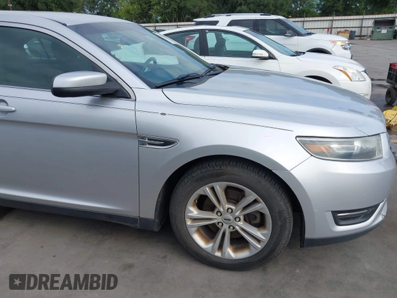 2015 Ford Taurus SEL z VIN 1FAHP2E88FG133328, wystawiony jako IAAI lot #42179649 z przebiegiem 127 171 mil mil oraz . Historia ofert i sprzedaży dostępna na DreamBid. Obrazek 18.