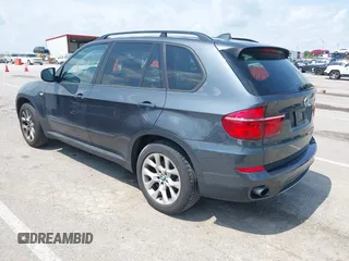 2011 BMW X5 35i with VIN 5UXZV4C57BL739907, listed as a IAAI auction lot 42135572 with 0 mi miles. Bid and sale history available at carsss.com. Image 3.