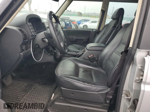 2004 Land Rover Discovery with VIN SALTP19444A835340, listed as a Copart auction lot 84498614 with 103,055 mi miles and Clean Title. Bid and sale history available at DreamBid. Image 7.