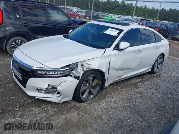 2019 Honda Accord Touring with VIN 1HGCV2F96KA009252, listed as a IAAI auction lot 42003043 with 76,249 mi miles and . Bid and sale history available at DreamBid. Image 2.