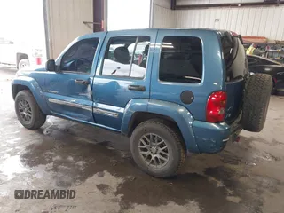 2004 Jeep Liberty Limited with VIN 1J4GK58K84W226666, listed as a IAAI auction lot 41764238 with 148,664 mi miles. Bid and sale history available at carsss.com. Image 3.