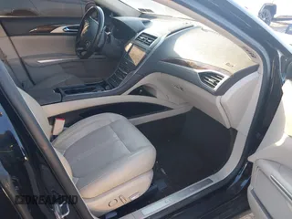 2016 Lincoln MKZ with VIN 3LN6L2G98GR601230, listed as a IAAI auction lot 40869401 with 80,107 mi miles. Bid and sale history available at carsss.com. Image 5.