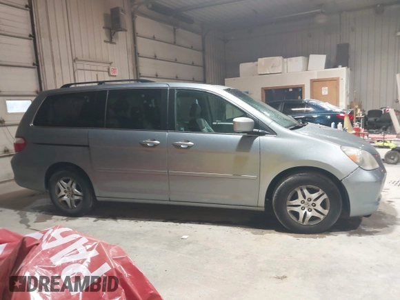 2007 Honda Odyssey EX-L with VIN 5FNRL38697B012944, listed as a IAAI auction lot 42144250 with 234,016 mi miles and . Bid and sale history available at DreamBid. Image 13.