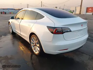2018 Tesla Model 3 Long Range Battery with VIN 5YJ3E1EA1JF164821, listed as a IAAI auction lot 41277446 with 31,602 mi miles. Bid and sale history available at carsss.com. Image 3.