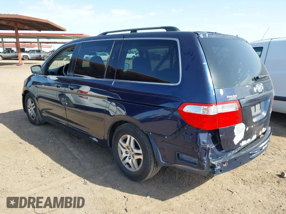 2005 Honda Odyssey EX-L with VIN 5FNRL38755B007567, listed as a IAAI auction lot 41952348 with 183,514 mi miles and . Bid and sale history available at carsss.com. Image 3.