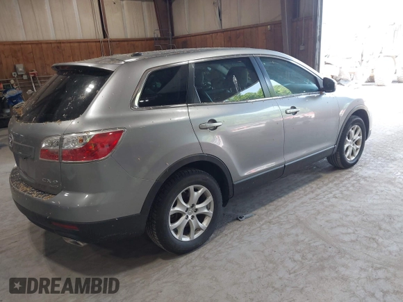 2011 Mazda CX-9 Touring with VIN JM3TB3CV2B0331219, listed as a IAAI auction lot 42408797 with 115,377 mi miles and . Bid and sale history available at DreamBid. Image 4.