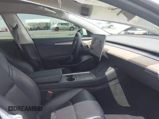 2021 Tesla Model 3 Performance with VIN 5YJ3E1EC2MF084594, listed as a IAAI auction lot 42030339 with 43,215 mi miles and . Bid and sale history available at DreamBid. Image 5.