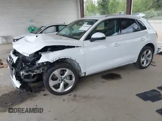 2021 Audi Q5 Premium Plus z VIN WA1BAAFY5M2004171, wystawiony jako IAAI lot #42140899 z przebiegiem 62 544 mil mil oraz . Historia ofert i sprzedaży dostępna na DreamBid. Obrazek 18.