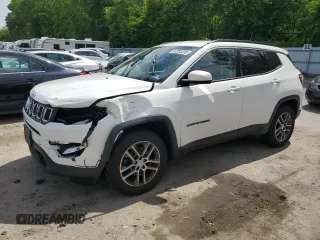 2017 Jeep Compass Latitude z VIN 3C4NJDBB1HT650656, wystawiony jako Copart lot #57285335 z przebiegiem 60 254 mil mil oraz Szkoda całkowita • Salvage title. Historia ofert i sprzedaży dostępna na DreamBid. Obrazek 1.