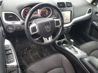 2013 Dodge Journey Crew with VIN 3C4PDCCG4DT698618, listed as a Copart auction lot 87632875 with 198,284 mi miles and Salvage title. Bid and sale history available at DreamBid. Image 8.