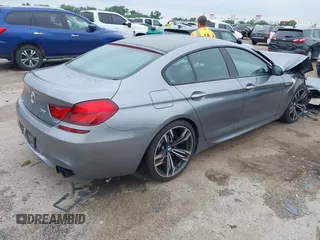 2014 BMW M6 with VIN WBS6C9C54EDV73926, listed as a IAAI auction lot 42421586 with 82,216 mi miles and . Bid and sale history available at DreamBid. Image 4.