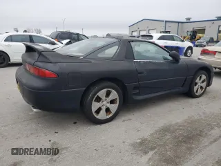 1998 Mitsubishi 3000GT z VIN JA3AM44H8WY000594, wystawiony jako Copart lot #44164155 z przebiegiem 92 227 mil mil oraz Czysty tytuł • Clean title. Historia ofert i sprzedaży dostępna na DreamBid. Obrazek 3.