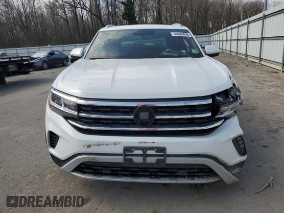 2021 Volkswagen Atlas SE with VIN 1V2JE2CA4MC229791, listed as a Copart auction lot 48929455 with 76,407 mi miles and Salvage title. Bid and sale history available at DreamBid. Image 5.