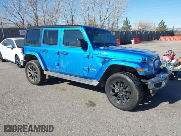 2023 Jeep Wrangler Sahara z VIN 1C4JJXP60PW513969, wystawiony jako IAAI lot #41766631 z przebiegiem 34 819 mil mil oraz . Historia ofert i sprzedaży dostępna na DreamBid. Obrazek 1.