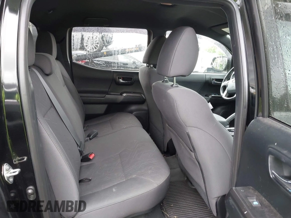 2017 Toyota Tacoma SR5 with VIN 3TMDZ5BN7HM017433, listed as a IAAI auction lot 42303178 with 69,510 mi miles and . Bid and sale history available at DreamBid. Image 8.