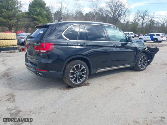2017 BMW X5 xDrive35i with VIN 5UXKR0C36H0V77999, listed as a IAAI auction lot 41867766 with 98,222 mi miles. Bid and sale history available at carsss.com. Image 4.