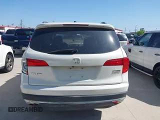 2016 Honda Pilot Touring with VIN 5FNYF6H97GB088824, listed as a IAAI auction lot 41991803 with 84,761 mi miles. Bid and sale history available at carsss.com. Image 17.