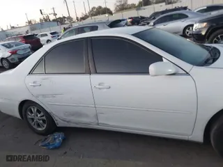 2004 Toyota Camry LE with VIN 4T1BF32K04U081583, listed as a IAAI auction lot 41139977 with 121,460 mi miles. Bid and sale history available at carsss.com. Image 13.