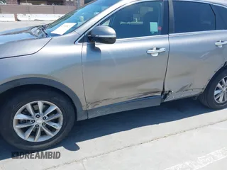 2016 Kia Sorento LX with VIN 5XYPG4A51GG077296, listed as a IAAI auction lot 42385823 with 137,076 mi miles and . Bid and sale history available at DreamBid. Image 6.