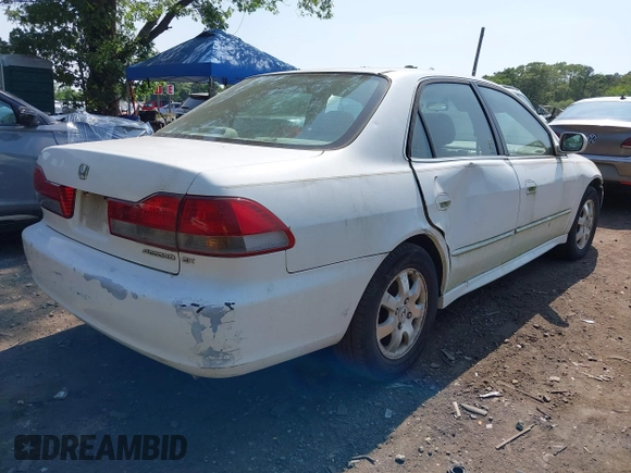 2001 Honda Accord EX z VIN 1HGCG56611A124406, wystawiony jako IAAI lot #42401266 z przebiegiem 177 917 mil mil oraz . Historia ofert i sprzedaży dostępna na DreamBid. Obrazek 4.