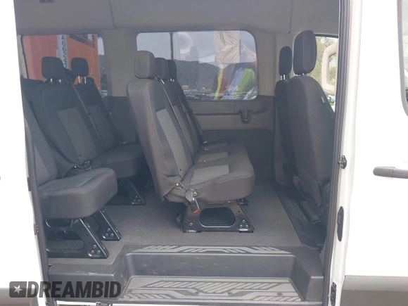 2023 Ford Transit Passenger XL с VIN 1FDAX2C80PKA74557, выставлен на аукционе IAAI как лот 41864316 с пробегом 50 640 миль миль и . История ставок и продаж доступна на DreamBid. Изображение 8.