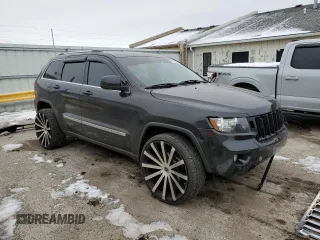 2012 Jeep Grand Cherokee Laredo with VIN 1C4RJFAG9CC346909, listed as a Copart auction lot 85941914 with 113,594 mi miles and Clean Title. Bid and sale history available at carsss.com. Image 4.