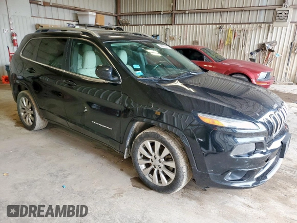 2016 Jeep Cherokee Overland with VIN 1C4PJLJB7GW336121, listed as a Copart auction lot 59692375 with 231,251 mi miles and Clean title. Bid and sale history available at DreamBid. Image 4.