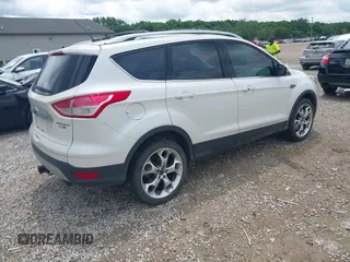 2016 Ford Escape Titanium z VIN 1FMCU9J90GUC76504, wystawiony jako IAAI lot #42552851 z przebiegiem 89 570 mil mil oraz . Historia ofert i sprzedaży dostępna na DreamBid. Obrazek 4.