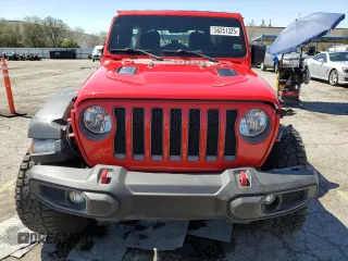 2019 Jeep Wrangler Unlimited Rubicon with VIN 1C4HJXFN7KW519171, listed as a Copart auction lot 56251325 with 69,094 mi miles and Salvage title. Bid and sale history available at DreamBid. Image 5.