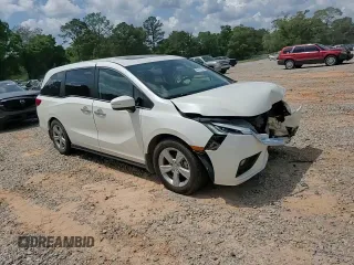 2019 Honda Odyssey EX-L z VIN 5FNRL6H75KB003287, wystawiony jako Copart lot #54917985 z przebiegiem 156 750 mil mil oraz Szkoda całkowita • Salvage title. Historia ofert i sprzedaży dostępna na DreamBid. Obrazek 14.