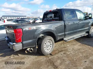 2022 Ford F-250 XL with VIN 1FT7W2BT6NEC70084, listed as a IAAI auction lot 41231141 with 102,658 mi miles and . Bid and sale history available at DreamBid. Image 4.