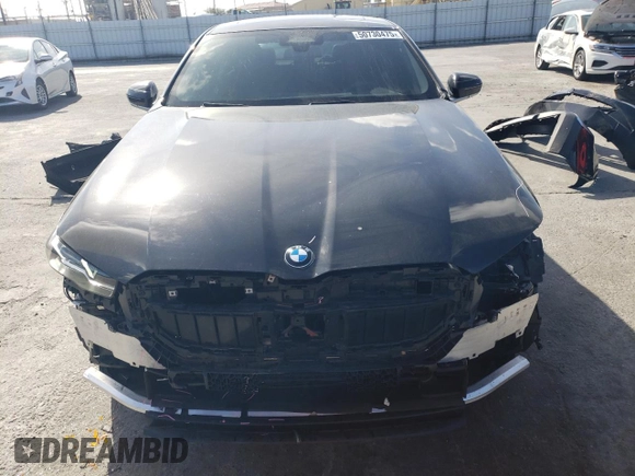 2024 BMW 5 Series 530i with VIN WBA43FJ08RCP78906, listed as a Copart auction lot 50730475 with 29,442 mi miles and Salvage title. Bid and sale history available at DreamBid. Image 5.
