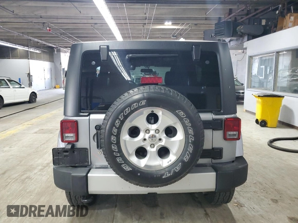 2015 Jeep Wrangler Unlimited Sahara with VIN 1C4BJWEG5FL743663, listed as a Copart auction lot 60205225 with 69,922 mi miles and Salvage title. Bid and sale history available at DreamBid. Image 6.