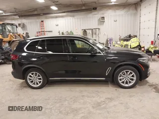 2023 BMW X5 xDrive40i with VIN 5UXCR6C08P9R88991, listed as a IAAI auction lot 41965881 with 33,136 mi miles. Bid and sale history available at carsss.com. Image 13.
