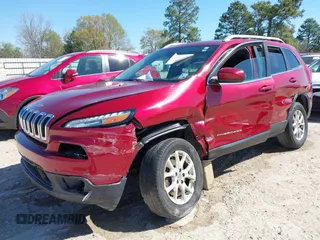 2015 Jeep Cherokee North with VIN 1C4PJMCSXFW654090, listed as a IAAI auction lot 41844434 with 198,592 mi miles. Bid and sale history available at carsss.com. Image 6.