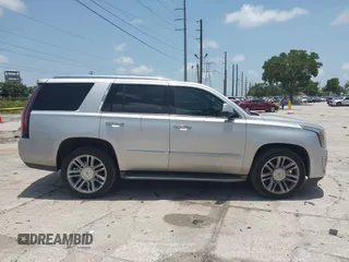 2015 Cadillac Escalade Premium z VIN 1GYS3NKJ0FR500158, wystawiony jako IAAI lot #42439343 z przebiegiem 159 487 mil mil oraz . Historia ofert i sprzedaży dostępna na DreamBid. Obrazek 13.