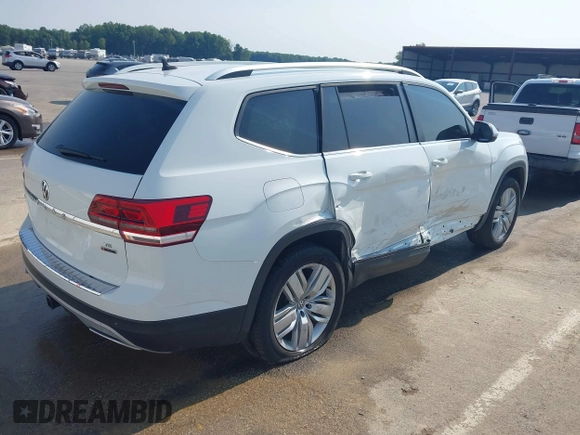 2019 Volkswagen Atlas SE with VIN 1V2UR2CA6KC549094, listed as a IAAI auction lot 42385802 with 61,718 mi miles and . Bid and sale history available at DreamBid. Image 4.