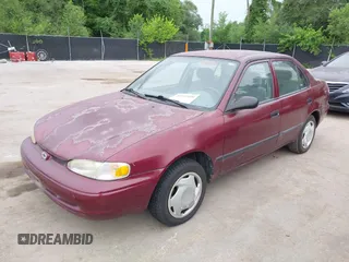1998 Chevrolet Prizm Lsi z VIN 1Y1SK528XWZ423879, wystawiony jako IAAI lot #42522200 z przebiegiem 171 445 mil mil oraz . Historia ofert i sprzedaży dostępna na DreamBid. Obrazek 2.