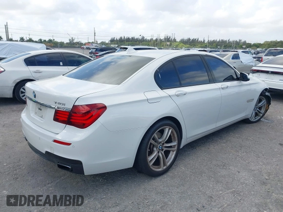 2014 BMW 7 Series 740i with VIN WBAYA6C53ED144195, listed as a IAAI auction lot 41720500 with 123,776 mi miles and . Bid and sale history available at DreamBid. Image 4.