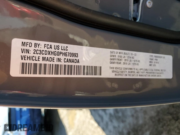 2023 Dodge Charger GT with VIN 2C3CDXHG0PH670993, listed as a Copart auction lot 48915405 with 7,740 mi miles and Salvage Title. Bid and sale history available at DreamBid. Image 13.