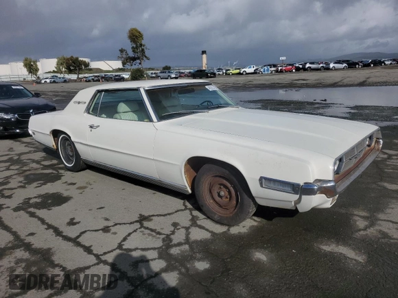 1969 Ford Thunderbird with VIN 9J83N122985, listed as a Copart auction lot 49285385 with 22,722 mi miles and Clean Title. Bid and sale history available at DreamBid. Image 4.