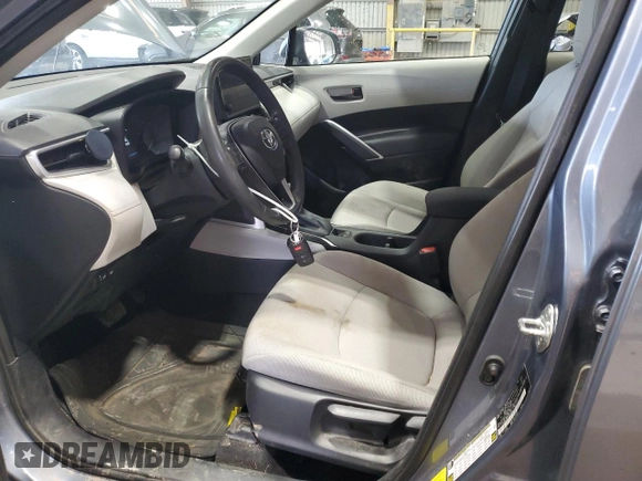 2023 Toyota Corolla Cross LE z VIN 7MUBAAAG4PV042580, wystawiony jako Copart lot #60788025 z przebiegiem 59 576 mil mil oraz Szkoda całkowita • Salvage title. Historia ofert i sprzedaży dostępna na DreamBid. Obrazek 7.