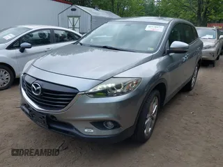 2013 Mazda CX-9 Grand Touring with VIN JM3TB3DV1D0409510, listed as a IAAI auction lot 42578873 with 154,570 mi miles and . Bid and sale history available at DreamBid. Image 17.