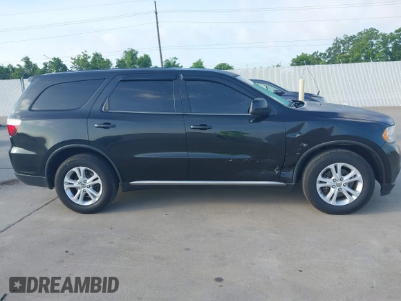 2012 Dodge Durango SXT with VIN 1C4RDJAG7CC293167, listed as a IAAI auction lot 42446634 with 140,182 mi miles and . Bid and sale history available at DreamBid. Image 13.