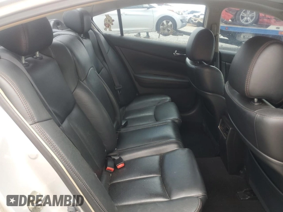 2012 Nissan Maxima SV с VIN 1N4AA5AP8CC864734, выставлен на аукционе Copart как лот 58805175 с пробегом 165 192 миль миль и Списание • Salvage title. История ставок и продаж доступна на DreamBid. Изображение 10.